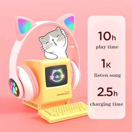 Cat Ear Bluetooth Headphones With Mic And Light Accents For Commuting showing pink cat-ear headset on retro mini PC with battery time