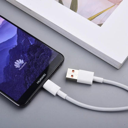 Practical 2-Meter USB to USB-C Cable for Everyday Device Charging connected to a Huawei phone on a desk, showing USB and USB-C ends and 2m reach