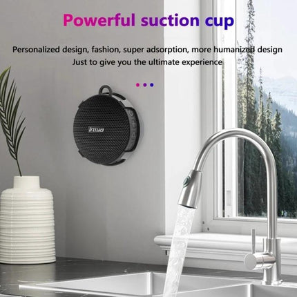 Compact Bluetooth Speaker With Bike Mount For Outdoor Use attached via suction cup to kitchen wall near sink showing waterproof use