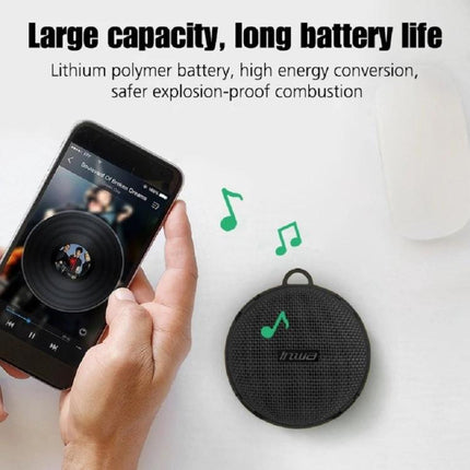 Compact Bluetooth Speaker With Bike Mount For Outdoor Use shown next to phone, portable waterproof zinc alloy rugged design