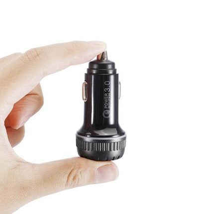Car Charger With QC3.0 Dual USB Ports And 1m 8 Pin Cable - compact black car charger in hand with dual USB QC3.0 ports and 1m 8-pin cable included
