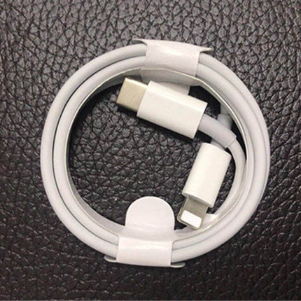 Car Charger With USB-C PD For On-The-Go Device Charging — coiled USB-C to Lightning cable for fast in-car charging
