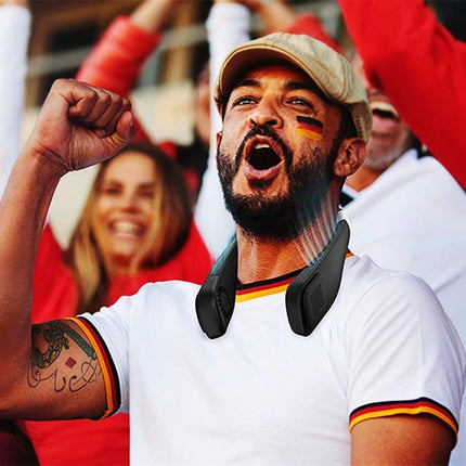 Man cheering at outdoor event wearing a Rechargeable Hands-Free Neck Fan for Outdoor and Office Use to keep cool while supporting his team