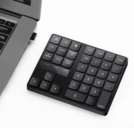 Wireless Numeric Keypad for Efficient Laptop Data Entry - compact 35-key wireless numeric keypad for fast spreadsheet and accounting input