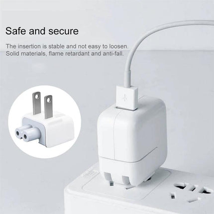 Compact USB Charger for Everyday Device Use at Home — white compact USB wall charger plugged into outlet charging a smartphone cable connected