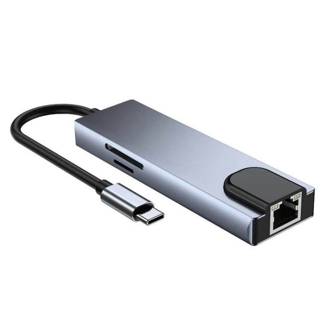 Type-C Multi-Port Hub Adapter for Device Expansion and Connectivity connecting USB-C laptop to Ethernet, HDMI, SD card and charging port