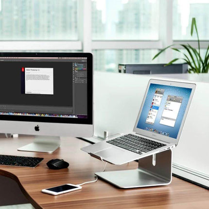 Aluminum Adjustable Laptop Stand for 11-17 Inch Laptops on desk with MacBook showing ergonomic elevated setup