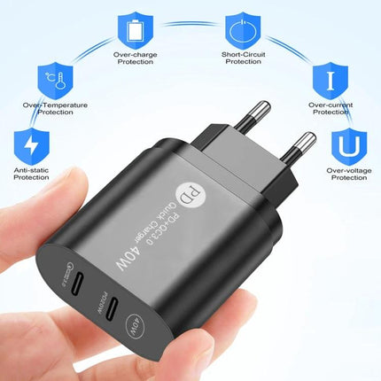 Compact Dual Port USB-C Charger for Home Office and Travel in hand showing dual USB-C ports and safety icons