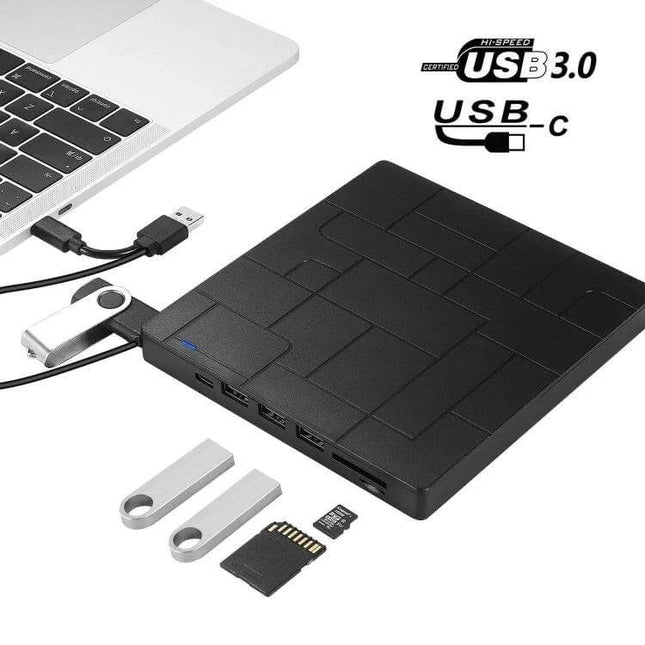 External USB DVD Recorder for Laptops and Desktops slim black external drive connected via USB to laptop with USB-C and flash drives