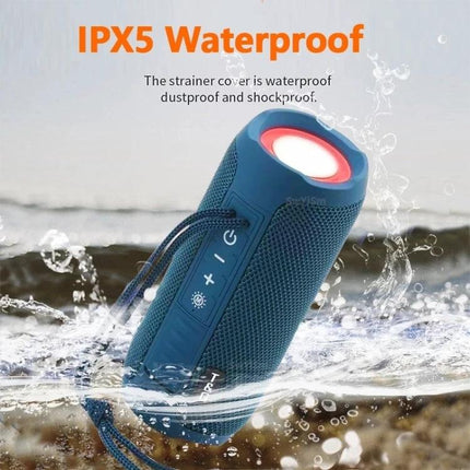 T And G Portable Weather Resistant Bluetooth Speaker For Outdoor Use shown IPX5 waterproof speaker splashing in water with colorful light