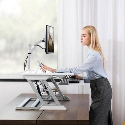 Height Adjustable Aluminum Monitor Stand for LCD Screens supporting up to 27" display, ergonomic setup on home office desk