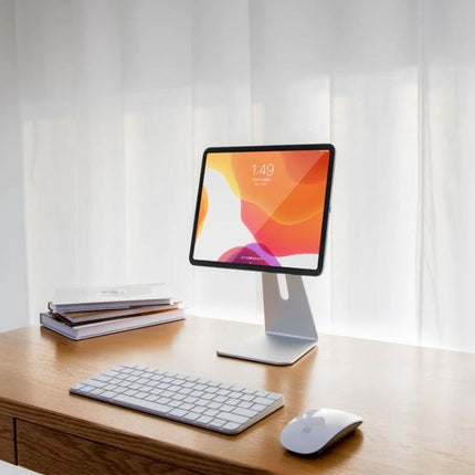 Magnetic Adjustable Aluminum Holder for iPad Pro 11 Inch mounted on desk stand showing iPad Pro in landscape for video calls and content creation