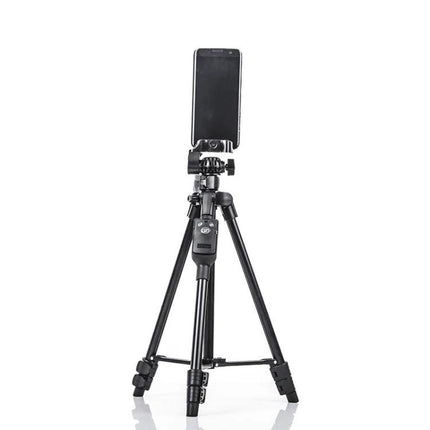 YUNTENG Portable Tripod for Smartphones with Bluetooth Remote Control shown holding a smartphone for stable travel vlogging and group photos