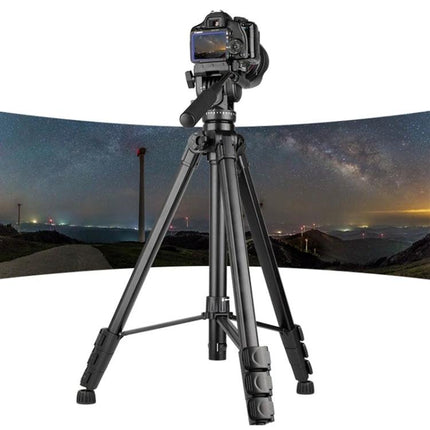 Yunteng Aluminum Tripod for Cameras and Travel Photography showing camera mounted on lightweight aluminum tripod with carrying bag for night landscape shots