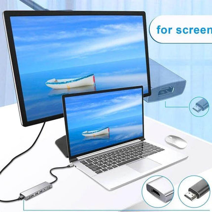USB-C 9-in-1 Multi-Port Hub for Video, Data, and Charging Connections connected to laptop and external monitor showing extended display