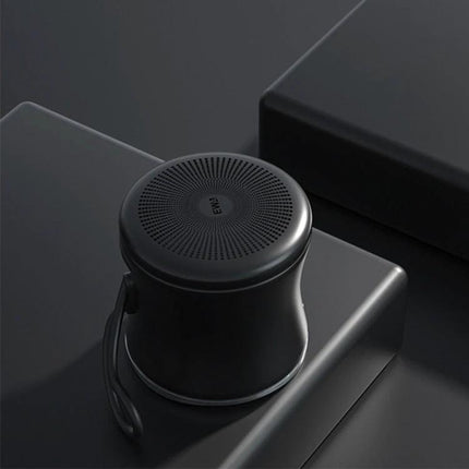 EWA Portable Speaker Pocket Sized For Travel And Jogging compact black Bluetooth speaker with stainless steel accents for travel