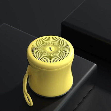 EWA Portable Speaker Pocket Sized For Travel And Jogging compact yellow Bluetooth speaker with metal accents