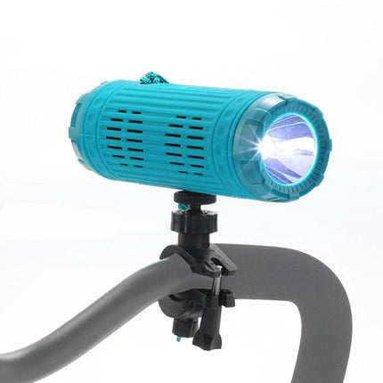TG Compact Bluetooth Speaker With Flashlight For Travel mounted on bike handle, streaming music and flashlight for outdoor picnics