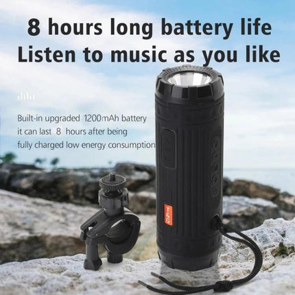 TG Compact Bluetooth Speaker With Flashlight For Travel shown on rocky picnic table with 8-hour battery and phone streaming nearby