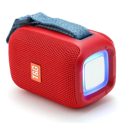 TG Portable Waterproof Bluetooth Speaker For Home And Picnic red cylindrical speaker with strap, waterproof mesh and glowing LED light