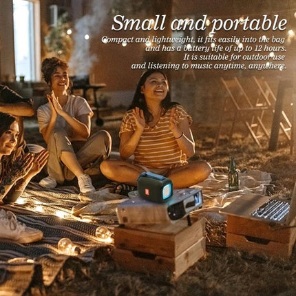 TG Portable Waterproof Bluetooth Speaker For Home And Picnic shown at a picnic scene with friends, compact waterproof outdoor speaker