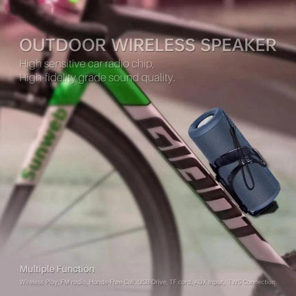 NewRixing Compact Bluetooth Speaker For Calls And Music shown strapped to a bicycle frame for portable outdoor use