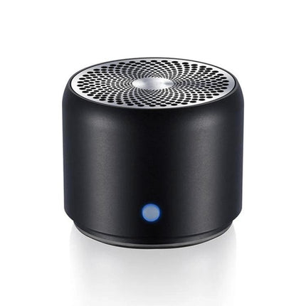 Compact Portable Bluetooth Speaker For Travel And Home Use showing black stainless steel cylinrical speaker with blue LED