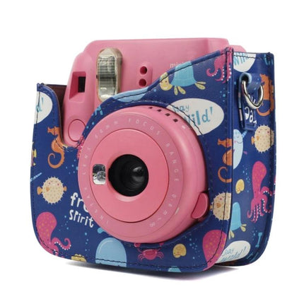 Protective Case for Fujifilm Instax Mini Cameras with Ocean World Pattern — navy ocean pattern case on pink Instax for travel protection