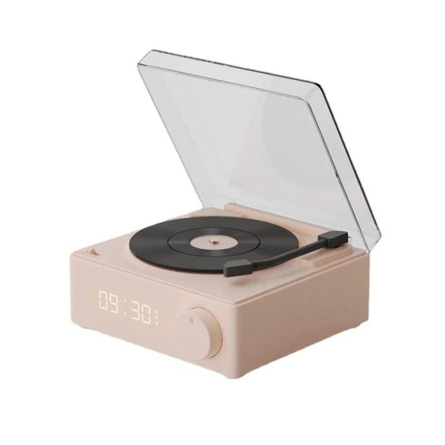 Duosi Retro Bluetooth Desk Speaker With Hidden Display And Alarm shown in pink retro turntable style with dimmable LED clock