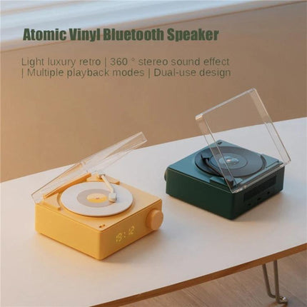 Duosi Retro Bluetooth Desk Speaker With Hidden Display And Alarm shown in yellow and green vintage phonograph-style desk speakers