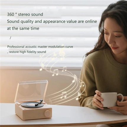 Duosi Retro Bluetooth Desk Speaker With Hidden Display And Alarm on desk playing music beside woman