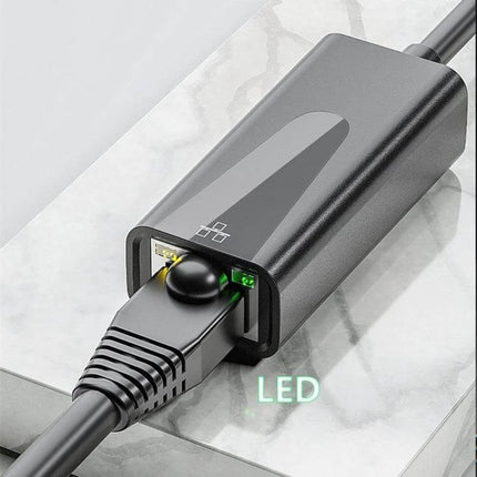USB-C Ethernet Adapter for Reliable Wired Internet Connections showing Ethernet cable plugged in with LED indicator