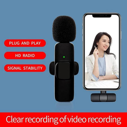 K9 Clip-on Microphone for Everyday Recordings and Chats - black clip mic shown with smartphone for clear hands-free vlogging and virtual meetings
