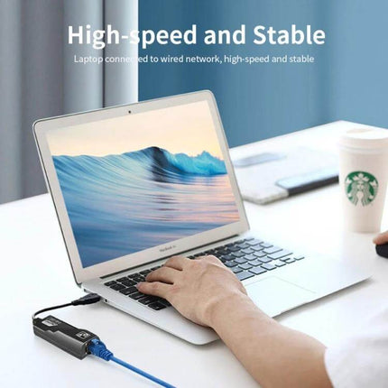 JSM USB 3.0 Ethernet Adapter for Reliable Network Connections plugged into laptop providing high-speed stable wired internet for remote work and streaming