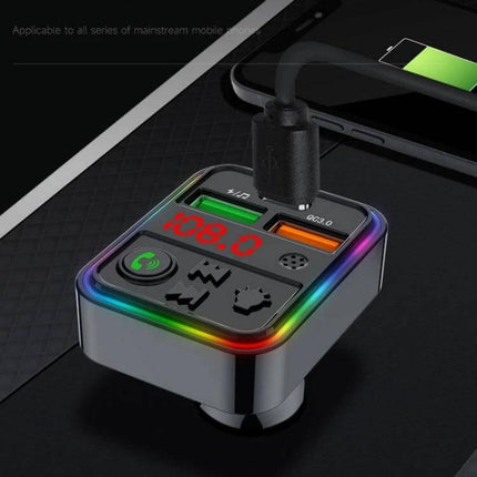Car Phone Charger With Bluetooth FM Transmitter For Smartphones shown charging phone, dual USB ports, LED display and rainbow edge for hands-free audio