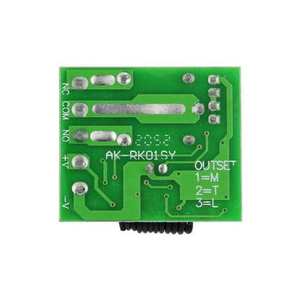 Compact Wireless RF Remote Control Switch for Home Devices green PCB back view showing terminals and traces