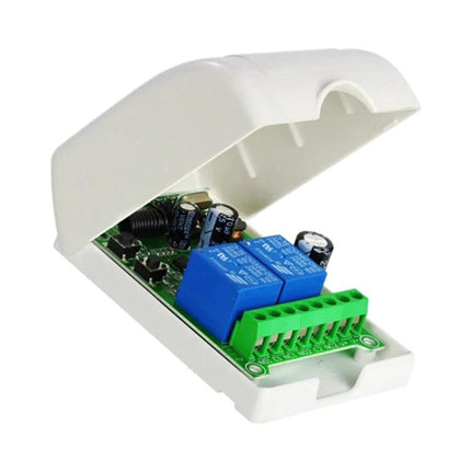 Universal Wireless Remote Control for Electric Door Systems - white ABS case opened showing circuit board with blue relays and green terminal block