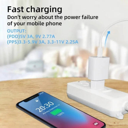 Versatile UK Plug Charger for Samsung Devices and Everyday Use - white PPS fast charger plugged into UK outlet charging smartphone at 100%