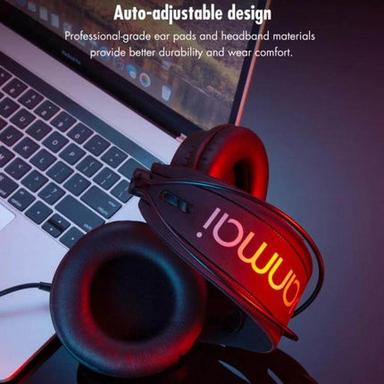 Yanmai Foldable Over Ear Headphones For Comfortable Travel Use shown folded on laptop with cushioned ear pads, travel-ready design