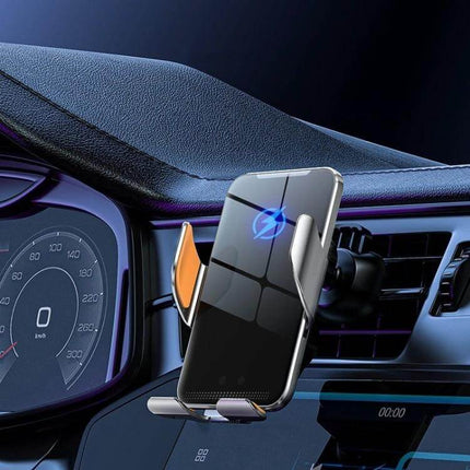 Car Wireless Charger Phone Holder With Auto Clamp Gray mounted on car vent charging a smartphone, auto-clamp grips and releases with touch