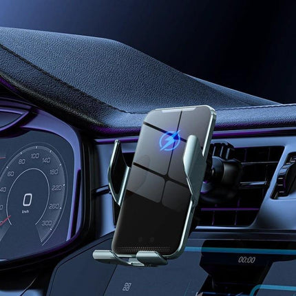 Car Wireless Charger Phone Holder With Auto Clamp Gray mounted on car vent holding smartphone displaying wireless charging icon, hands-free navigation