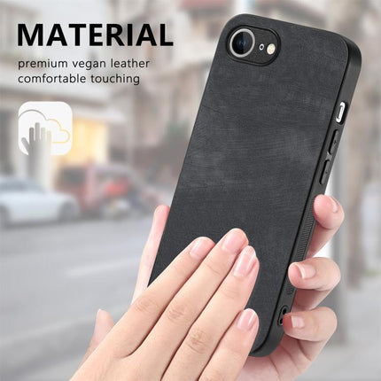 Vintage Leather Case for iPhone Everyday Protection in black leather with soft TPU core shown in hand
