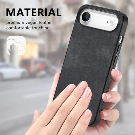 Vintage Leather Phone Case For Everyday iPhone Protection — black vegan leather case shown in hand, slim daily-protection design