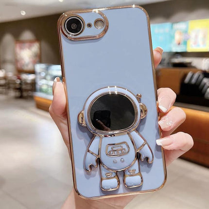 Phone Case With Integrated Stand For Hands Free Viewing featuring blue reflective astronaut stand design on slim protective case