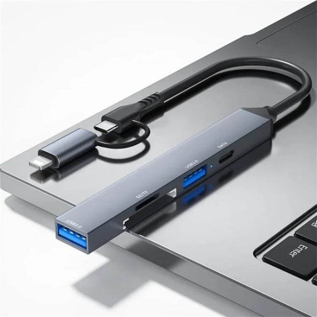 ADS-805 Multi-Function Hub for Data Transfer and Cards connected to laptop showing Type-C, USB and card reader ports