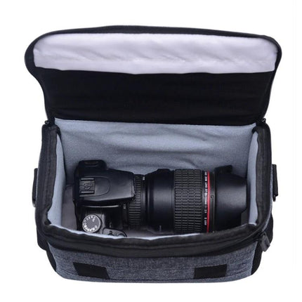 Waterproof Sling Shoulder Bag for Outdoor DSLR Camera Use - gray sling bag open showing DSLR camera and lens inside, front compartment