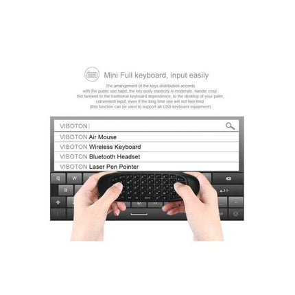 Wireless Mini Keyboard Remote for PC and Smart TV Control compact wireless keyboard remote held in hands with on-screen search and navigation features