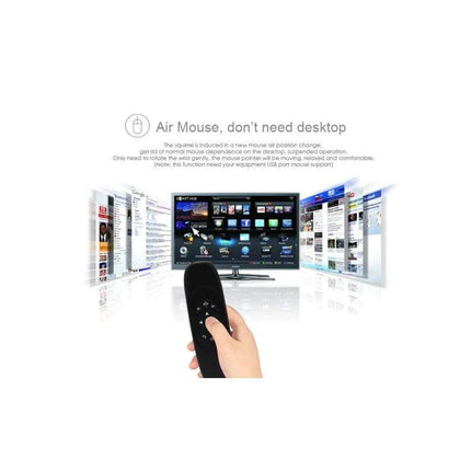 Wireless Mini Keyboard Remote for PC and Smart TV Control in hand pointing at smart TV interface, air mouse navigation for browsing