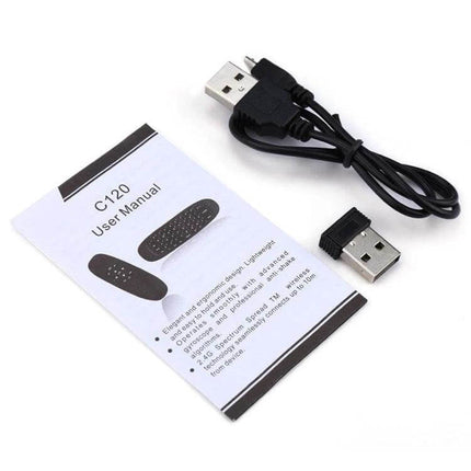 Wireless Mini Keyboard Remote for PC and Smart TV Control showing USB receiver, charging cable, and C120 user manual