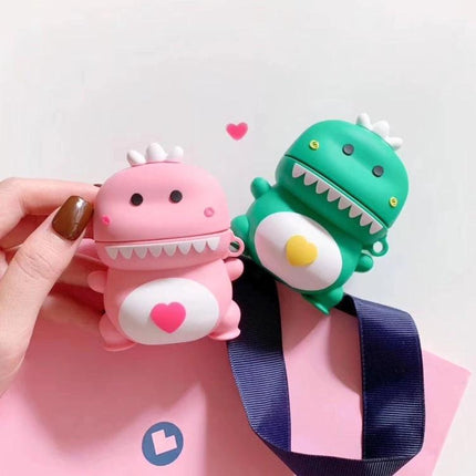 Dinosaur-Themed Holder for Everyday AirPods Storage and Protection — pink and green cute dustproof dinosaur cases holding AirPods